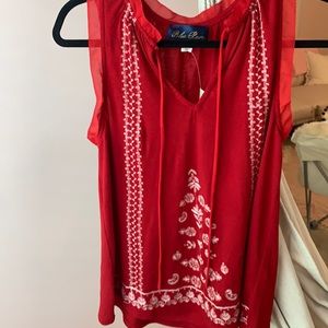 Women’s red tank top.